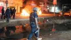 'You're not alone in the darkness': Gambia president urges calm after violent blackout protests — BBC Africa