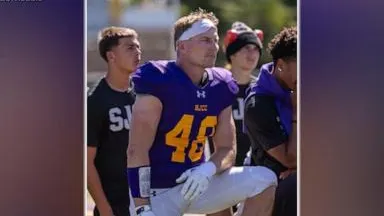 WATCH: Dad hits the gridiron at age 48 — photograph supplied by ABC News (US)