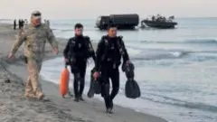 Senior Kazakh officials detained after 14 service members swept out to sea — photograph supplied by BBC World