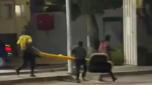 WATCH: ‘Thieves’ caught on camera walking off with Kenilworth traffic light — photograph supplied by IOL (site feed)