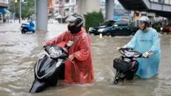 Bangkok roads submerged as flood disaster declared — BBC World