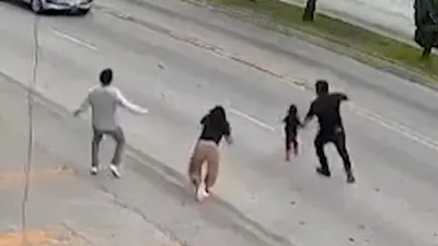 Video Shows Grocery Store Manager Saving Toddler From Oncoming Traffic — NYT World